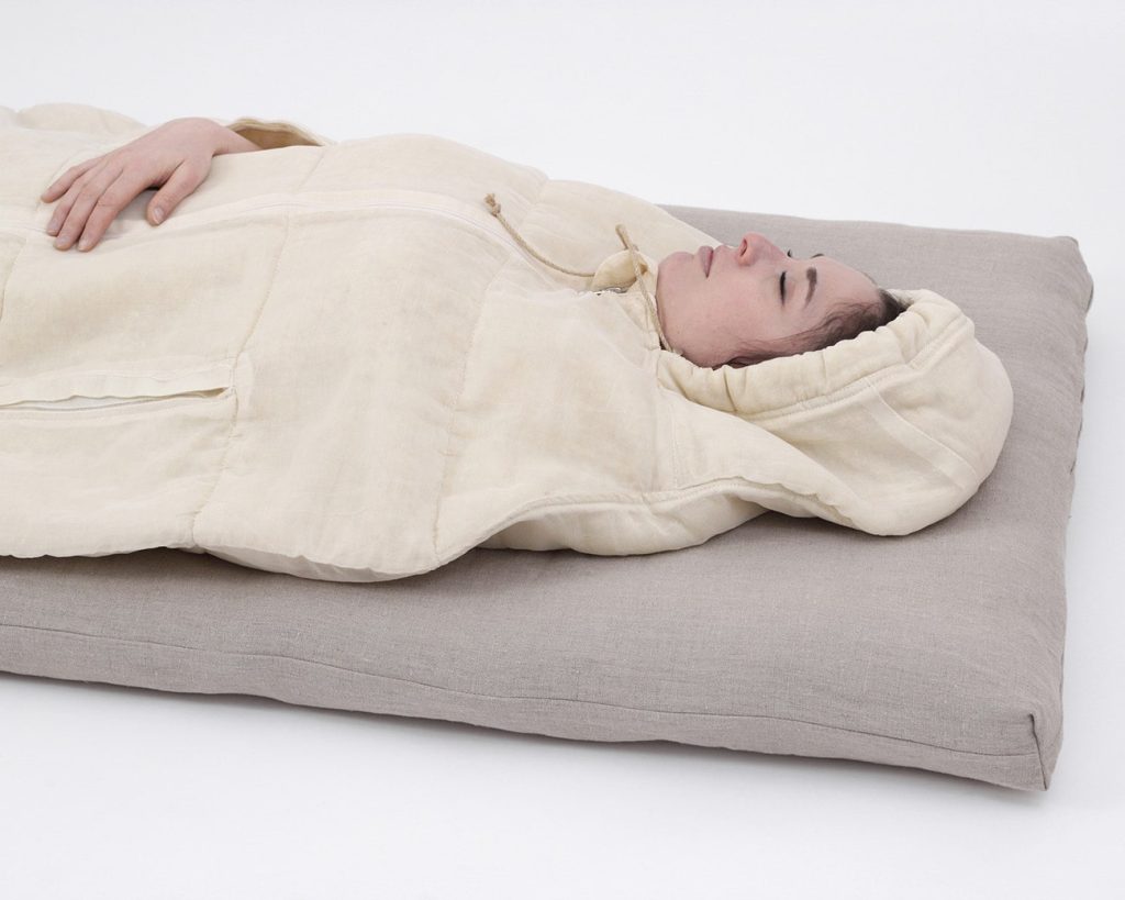 Nomad Heat Camping mattress, camping pad in use by model Nomad Heat Camping mattress, camping pad in use by model