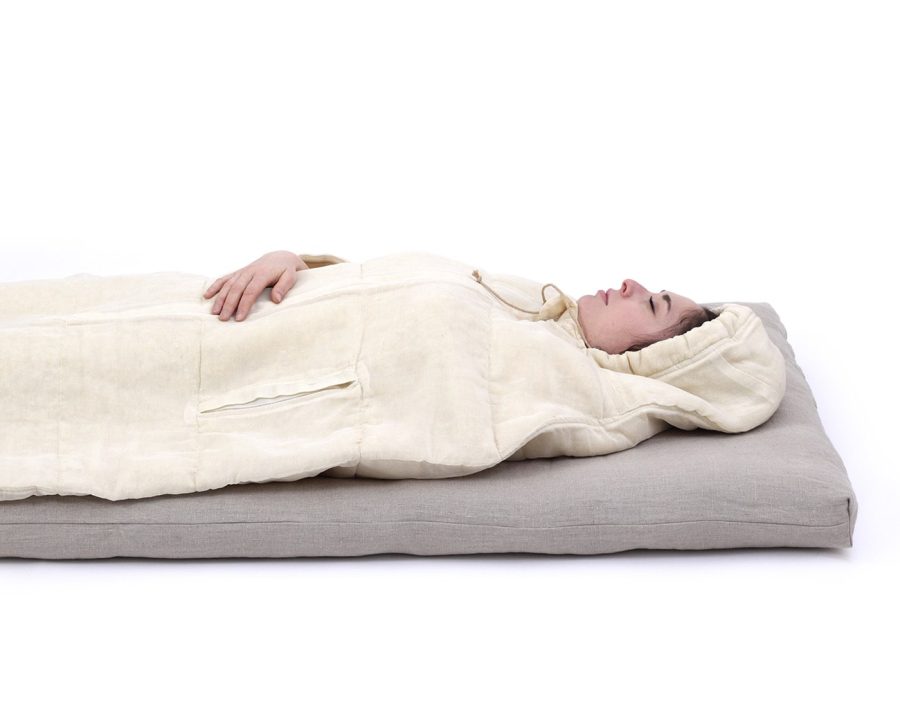 Nomad Heat Camping mattress, camping pad in use by model (2)