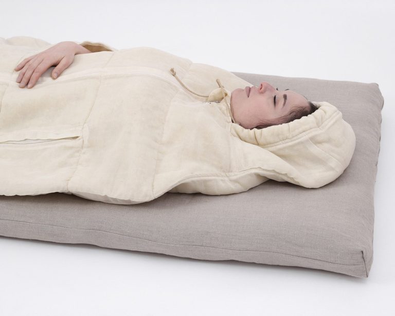 Nomad Heat Camping mattress, camping pad in use by model