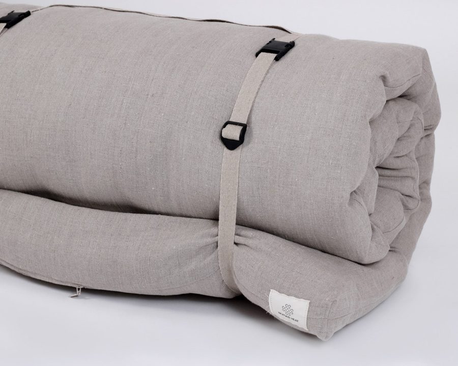 Nomad Heat Camping mattress, camping pad strapped up close
